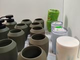 a lot of cups that are sitting on a table