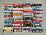 a lot of dvds stacked on top of each other