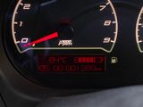 a close up of a speedometer on a car ' s dashboard
