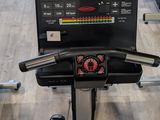 a close up of a tread on a tread machine in a gym
