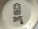a white plate with a castle on it on a table