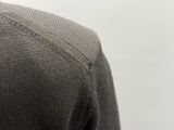 an image of a close up of a person ' s sweater