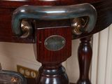 a wooden table with a clock on top of it