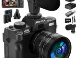 a close up of a camera with a microphone and other accessories