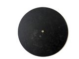 a picture of a black disc on a white surface