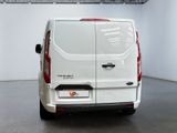 a white van that is parked in a room