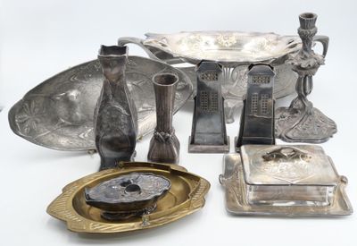 a lot of silver items that are on the table