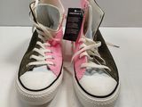 pair of pink and white converses on a white surface