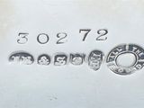 a close up of a piece of metal with numbers on it