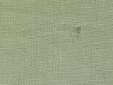 a close up of a piece of fabric with a hole in it