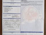 an image of a receipt with a picture of a house on it