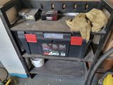 a workbench with tools on it in a garage