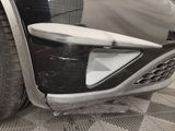 a close up of the front bumper of a car