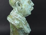 an image of a statue of a man with a hat on it ' s head
