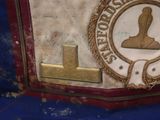 a close up of a bag with a badge on it
