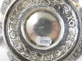 a silver plate that has a label on it