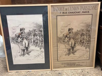 two framed pictures of military men in uniforms on a table