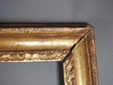 a picture of a picture of a gold frame