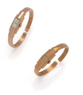 une image représentant deux bagues en or serties de diamants