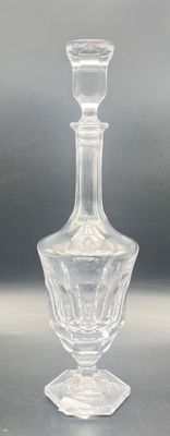a clear glass vase sitting on top of a table