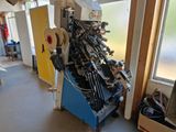 a machine that is sitting inside of a building