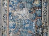 an image of a blue and white rug with a picture of a forest