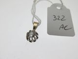 an image of a small diamond pendant with a price tag attached to it