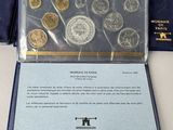 a lot of coins that are in a case
