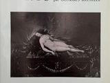 la couverture d'un livre sur laquelle figure une femme nue allongée sur un lit