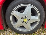 a close up of a car tire with a star on it