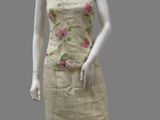 an image of a mannequin wearing a dress with flowers on it