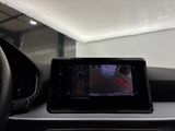 a picture of a car dashboard with a monitor on it