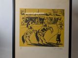 framed print of a man on a horse in a yellow background