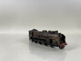 a toy train on a white surface with a white background