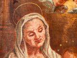 an old painting of a woman holding a baby in her arms