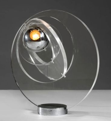 a close up of a glass sculpture with a light inside of it