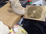 a box with a pair of shoes on top of it