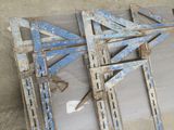 several pieces of metal sitting on the floor next to each other