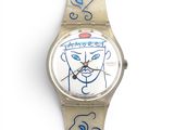 an image of a wrist watch with a drawing of a face on it