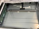 a glass door that is open on the inside of a machine