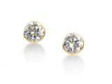 a pair of diamond stud earrings on a white background