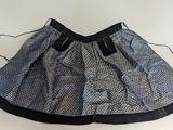 blue and black skirt on a white background with a black tie