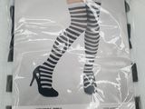 a package of black and white striped stockings with high heels