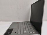 a laptop that is sitting on a white table