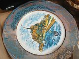 a plate with a picture of a castle on it