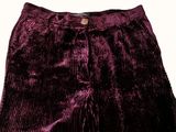 purple cordurope pants on a white background