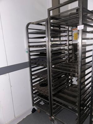 an image of a rack with trays of food on it