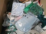 a box full of clothes and other items in it