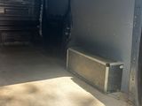 a truck that has its door open in the back of it
