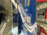 a box of toothbrushes on display in a store